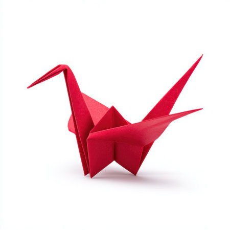 This stunning red origami crane showcases intricate folds and attention to detail, perfect for art projects, craft inspiration, or decorative purposes.の素材