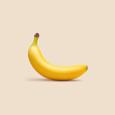 A vibrant yellow banana stands alone against a soft beige background, symbolizing healthy eating and nutritious choices. Perfect for food-related themes.の素材