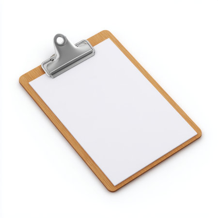 A blank clipboard rests on a clean white surface, offering a versatile solution for taking notes, organizing tasks, or creating lists in any environment.の素材