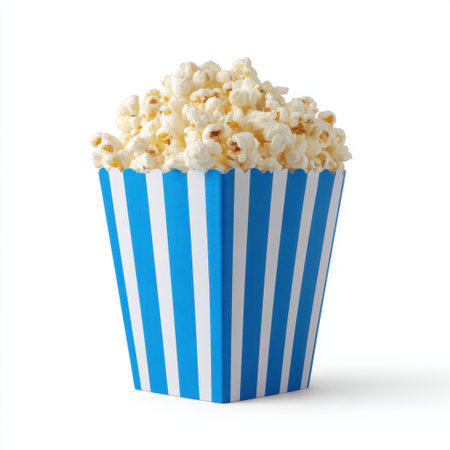This image showcases a vibrant blue and white striped container filled with freshly popped popcorn, perfect for movie nights or casual snacks, evoking a sense of fun and enjoyment.の素材