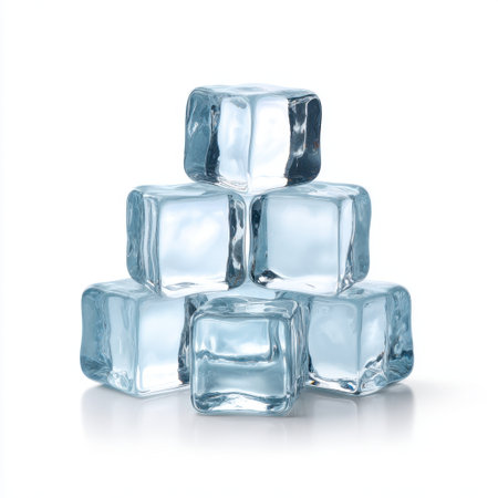 This image features a stack of clear ice cubes resting on a smooth white surface, ideal for enhancing summer drink visuals, adding a fresh, cool touch.の素材