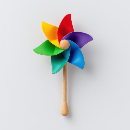 This vibrant pinwheel toy showcases a colorful design, perfect for childrenの素材
