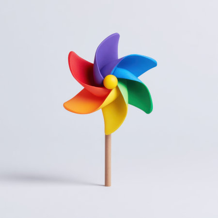 This vibrant windmill toy features bright colors and dynamic blades, creating a playful atmosphere perfect for child-friendly environments and creative projects.の素材