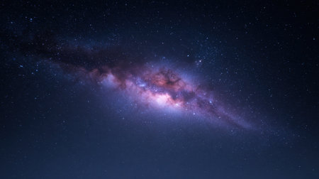 A stunning view of a colorful nebula and countless stars fills the night sky, creating an awe-inspiring cosmic landscape full of mystery and beauty.の素材