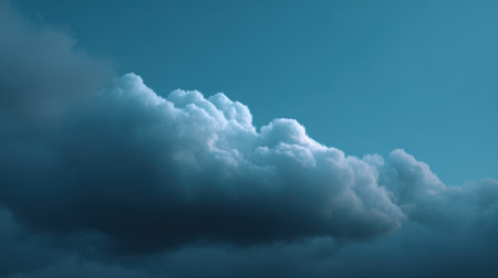 A beautiful view of soft clouds illuminated by dusk light, showcasing a tranquil blue sky atmosphere filled with serene details and textures.の素材