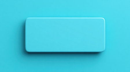 This image features a smooth, polished blue rectangular object on a vibrant mint background, ideal for minimalist design projects and creative concepts.の素材