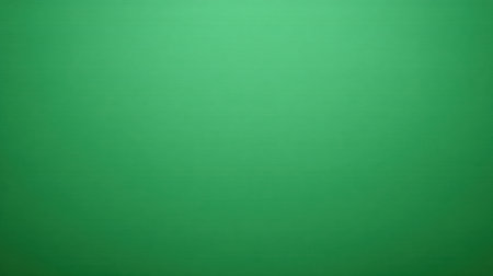 This smooth green background provides a calming and refreshing visual for various creative projects. Ideal for presentations, graphics, and artistic designs, its vibrant hue inspires creativity and complements a range of motifs.の素材