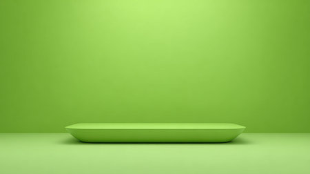A minimalist green background featuring a simple platform provides a blank canvas ideal for showcasing products, artwork, or creative concepts in design.の素材