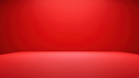 This vibrant red background features a smooth surface that serves as an ideal backdrop for photography, design, and creative projects, enhancing visual appeal.の素材
