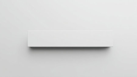 This image features a minimalistic white rectangle set against a soft gray background, ideal for modern design contexts and creative projects.の素材