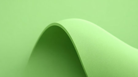 This image features a smooth green wave texture that creates an elegant and minimalist backdrop perfect for creative design projects and artistic endeavors.の素材