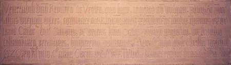 sandstone slab engraved with latin text