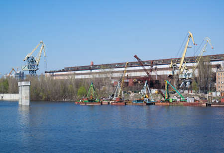 Parking river cranes on the river Dnieperの写真素材