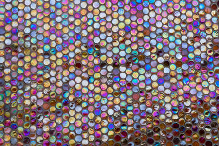 Background from round brilliant iridescent mosaicの写真素材
