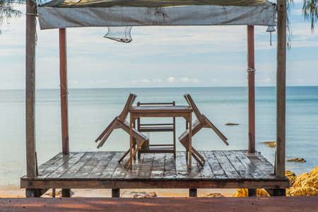 A set of beach chairs and table.の写真素材