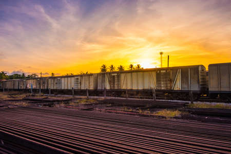 Old train with sunset background.のeditorial素材