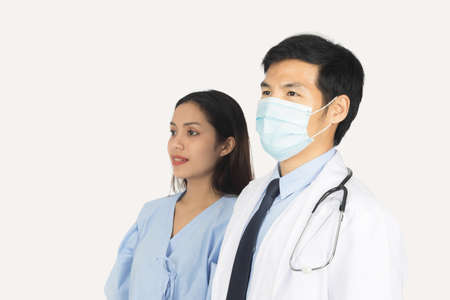 Isolated of portrait male doctor and female patient on white background.の写真素材