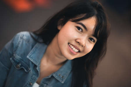 Beautiful Asian woman who has long hair travels to the festival at Yaowarat Chinatown in Thailand....