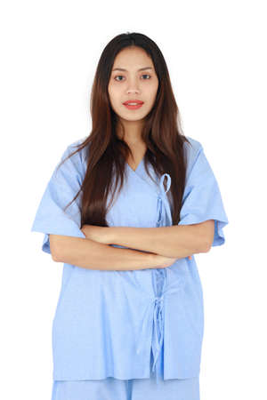 Isolated portrait of long hair beautiful woman smiling and stand with arms folded on white background. Business and medical concept.の写真素材