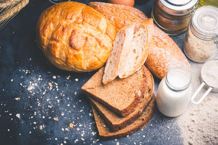 Fresh bread on wooden tableの写真素材