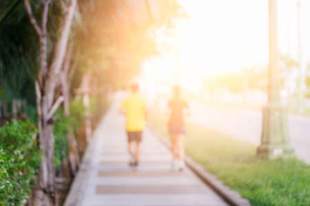 Blurred of people jogging in the park for abstract backgrond.の写真素材