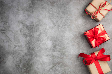 Top view of gift boxs on black background with copy space for your greeting.