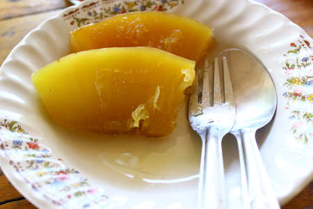 Pineapple to a plate to eat の写真素材
