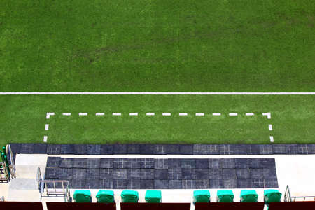 Line coaches in the football field 