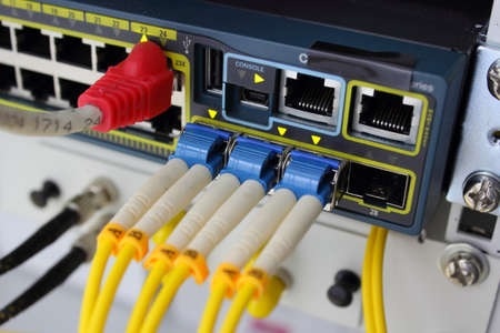 Optic fiber cables connected to an optic switch