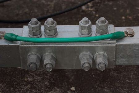Junction with steel nuts close.の写真素材