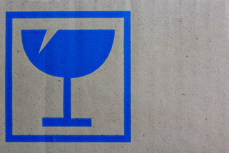 Symbol beside the box of glassの写真素材