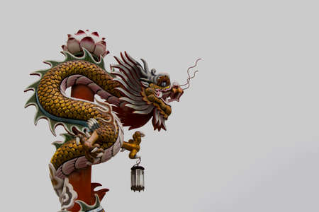 Chinese dragon statue  white sky backgroundの写真素材