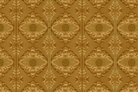 Cement gold  Crafts wall in the temple closeの写真素材