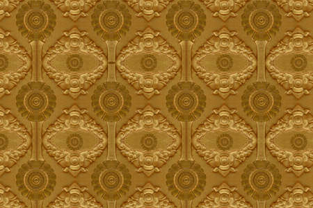 Cement gold  Crafts wall in the temple closeの写真素材