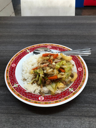 Rice with stir-fried pork and vegetables, Thai style foodの写真素材