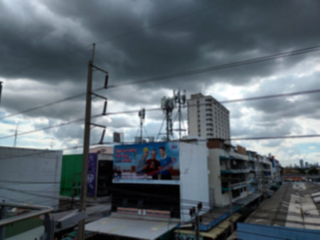 blurred background of car on the road with cloudy sky,Bangkok Thailandの写真素材