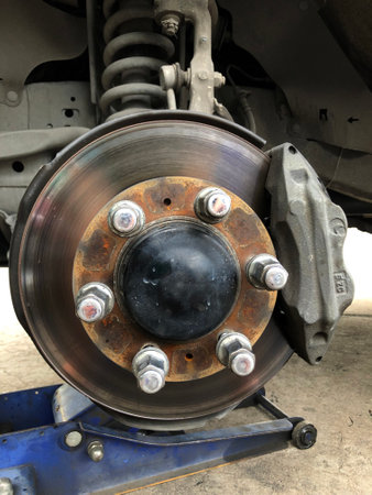 brake pads and brake disc of a car, closeup of photoの写真素材