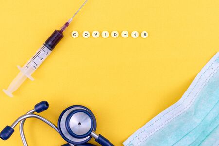Medical testing equipment on yellow background.の写真素材