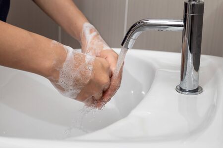 prevention by  wash hands and fingers with soap for frequently or using hand sanitizer gel.の写真素材