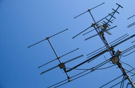 Antenna TV with the blue sky backgroundの写真素材