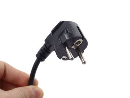 Male  hand with plug over white background