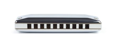 Mouth harmonica over white backgroundの写真素材