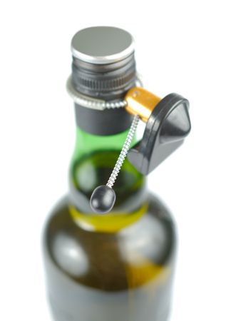 Bottle secured with magnetic bottle tag isolated over whiteの写真素材