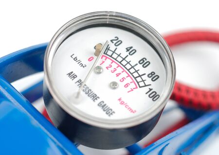 Close-up of manometer of air-pump isolated over white backgroundの写真素材