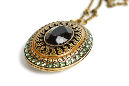 Brass medallion isolated with clipping path on white backgroundの写真素材