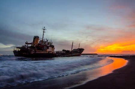 The boat ran aground on the seashore in Cijin, Kaohsiung.の写真素材