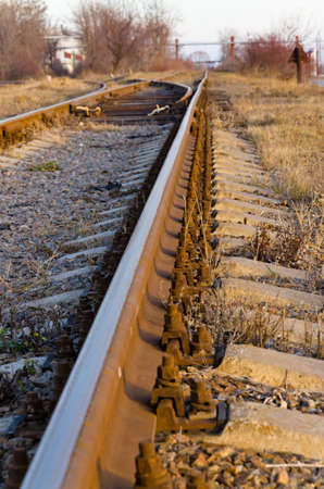 The railway passing through an industrial zoneの写真素材