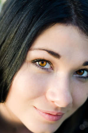 Close up portrait of attractive woman with brown eyesの写真素材