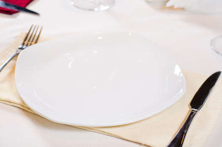 High Angle of Place Setting with White Plate and Cutleryの写真素材
