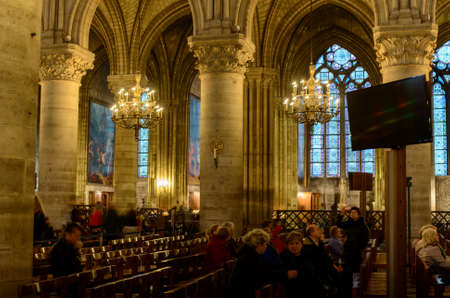 France, Paris 28 October 2015: Interior view of Notre-Dame Cathedral, a historic Catholic cathedral considered to be one of the finest examples of French Gothic architecture in Paris, Franceのeditorial素材